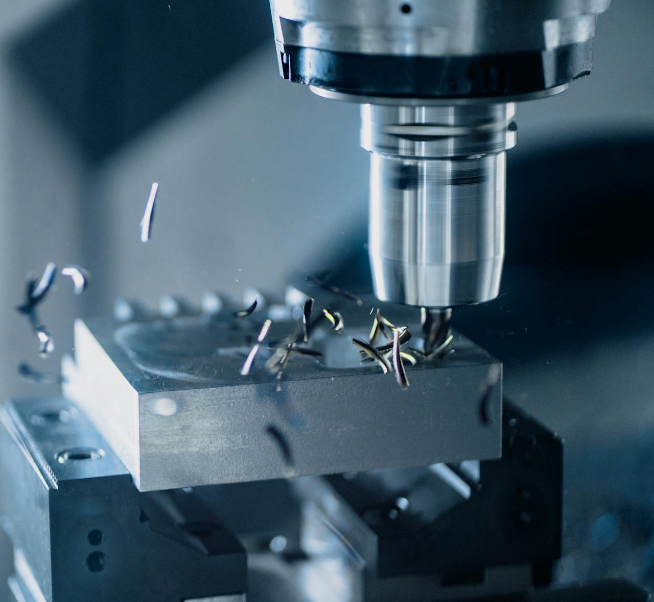 Home Close-up of a CNC milling machine working on metal for precise manufacturing.